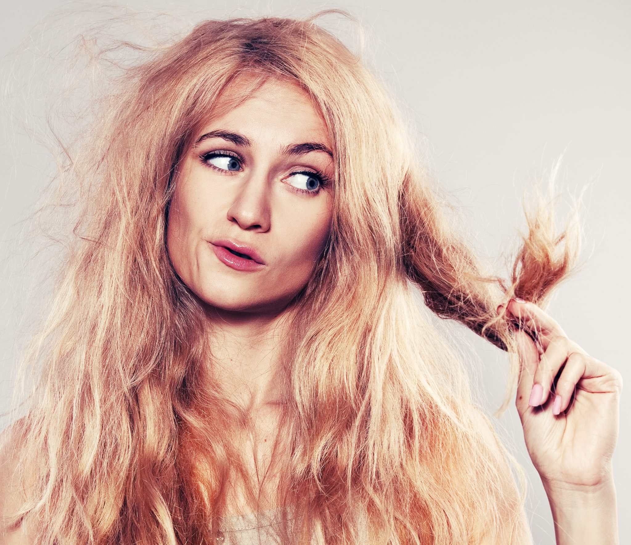 Why does my hair smell burnt after i wash it?