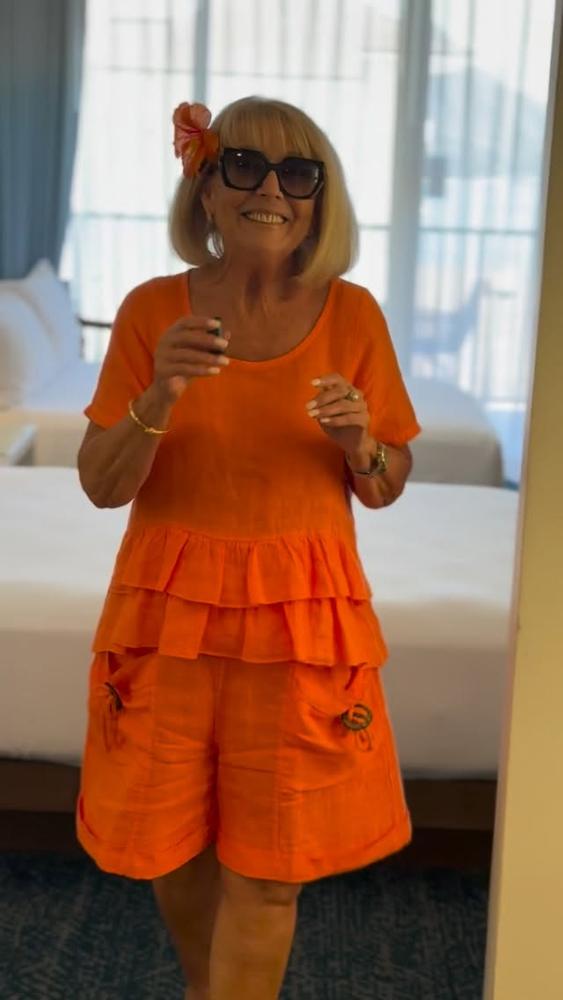 25 Orange Shorts Outfits For 50s Image