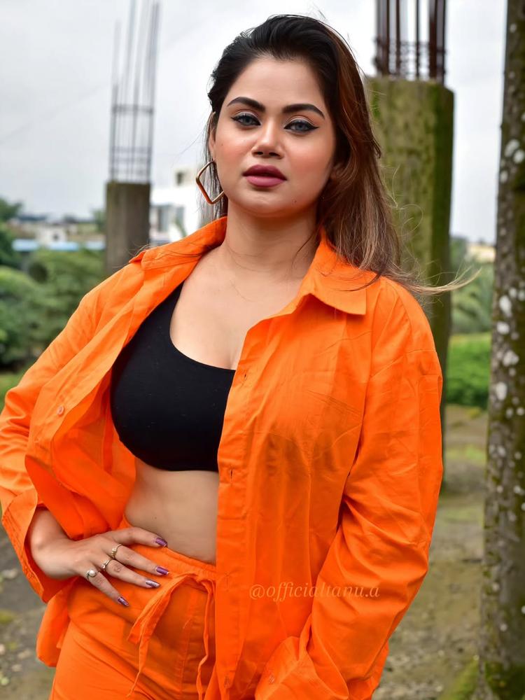 23 Orange Shorts Outfits Image
