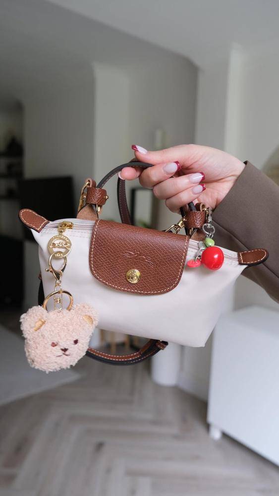 25 Longchamp Mini Pouch Outfits Image