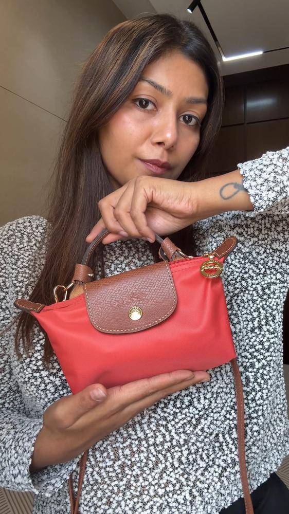 25 Longchamp Mini Pouch Outfits Image