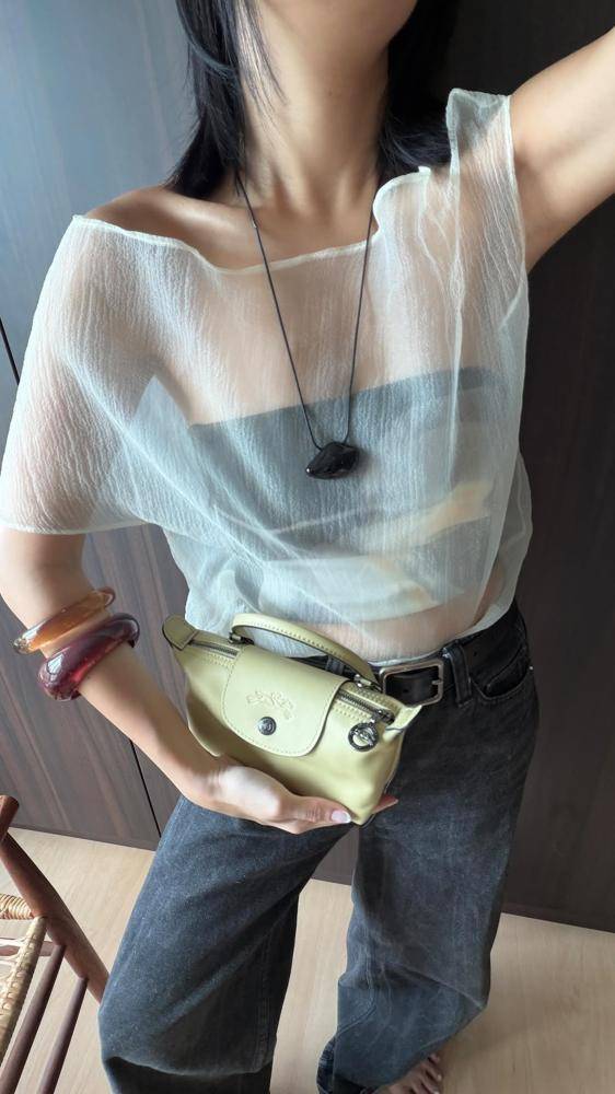 25 Longchamp Mini Pouch Outfits Image