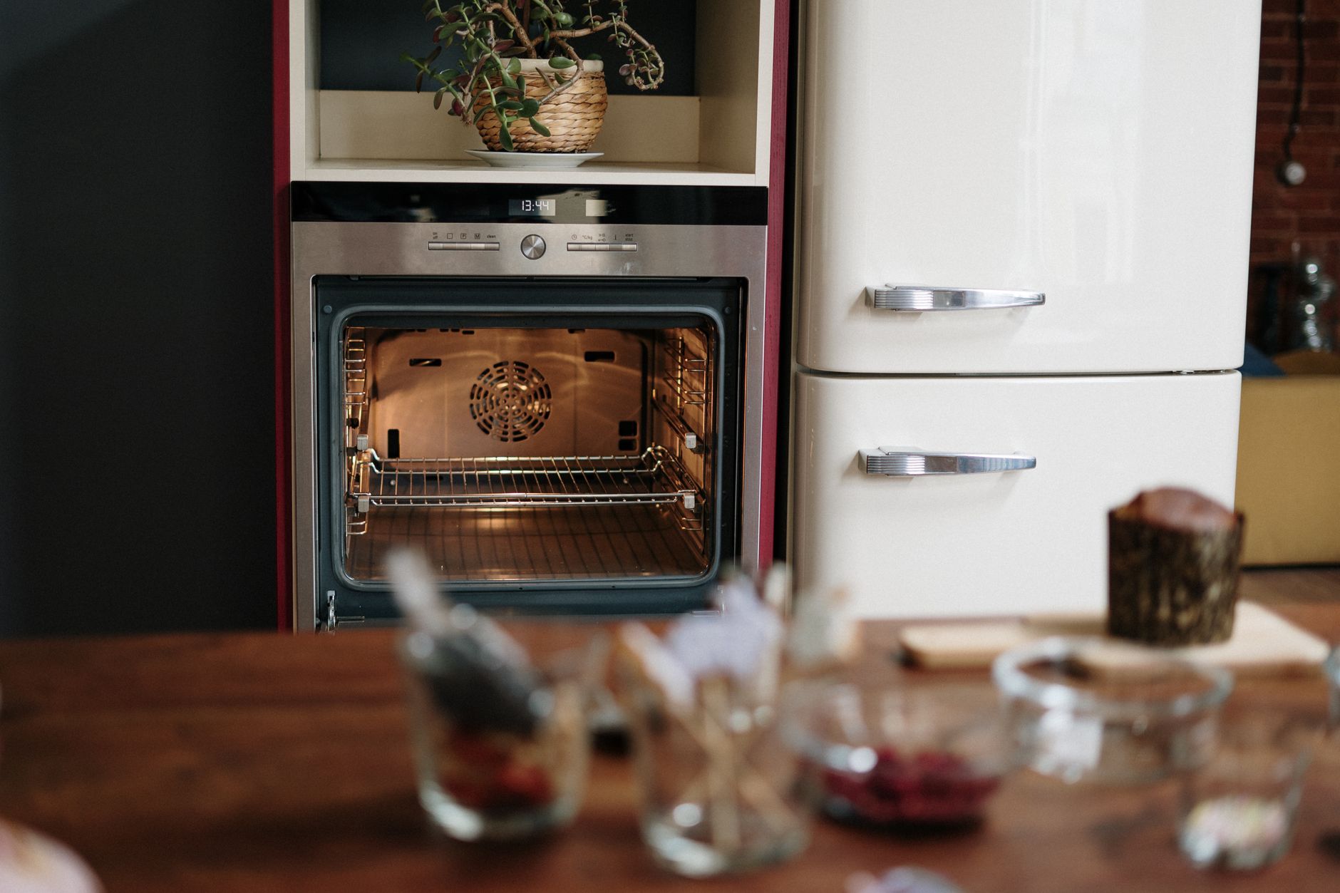 Homemade Oven Cleaner with Dawn Recipes woman cleaning oven with homemade cleaner